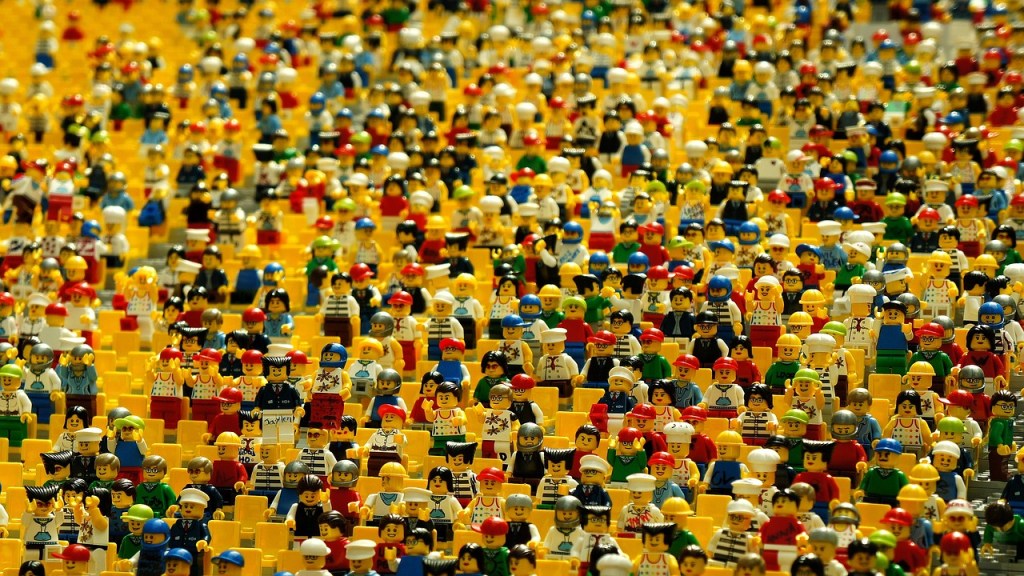 a bunch of lego people representing a crowd